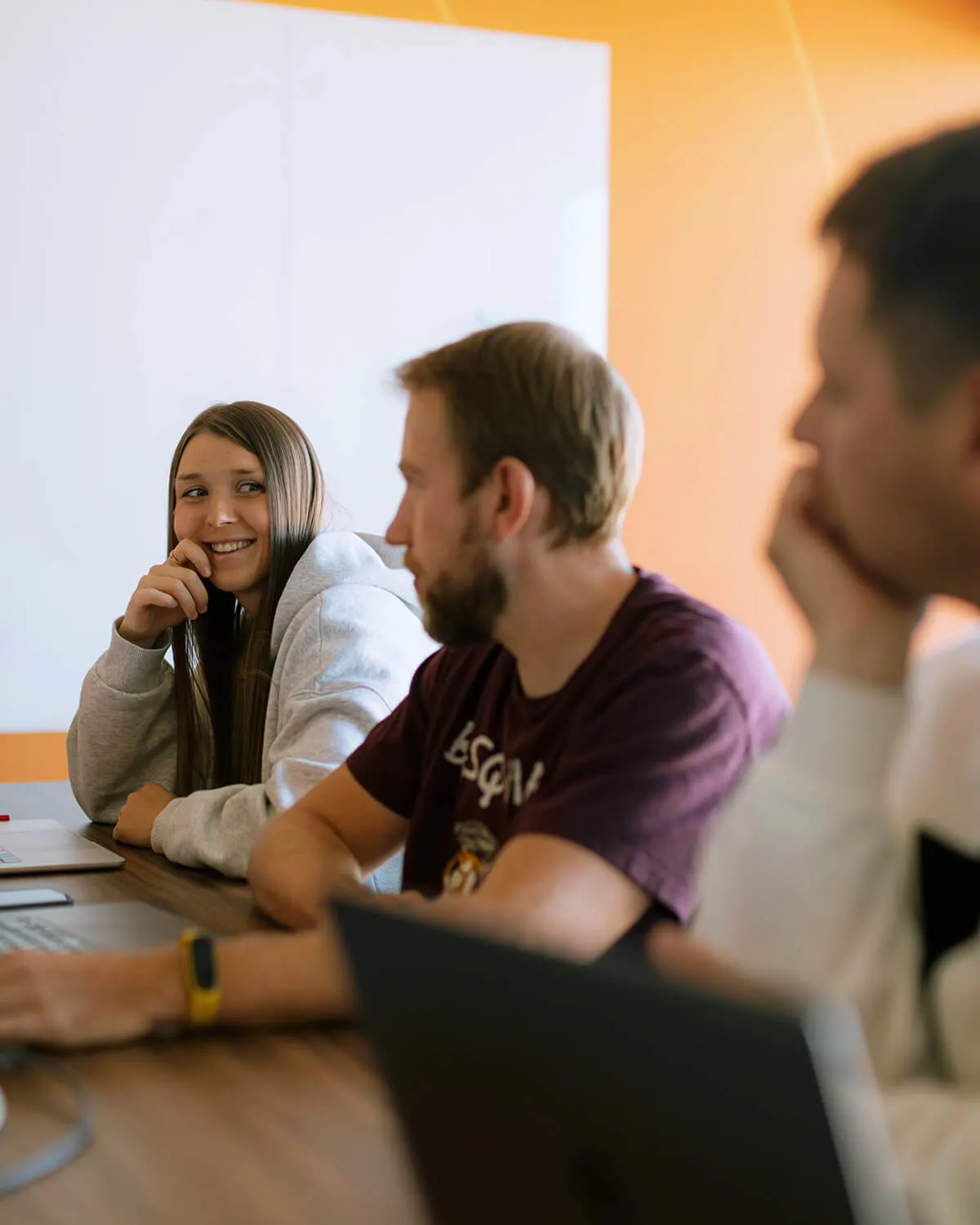 A group of interns in discussion