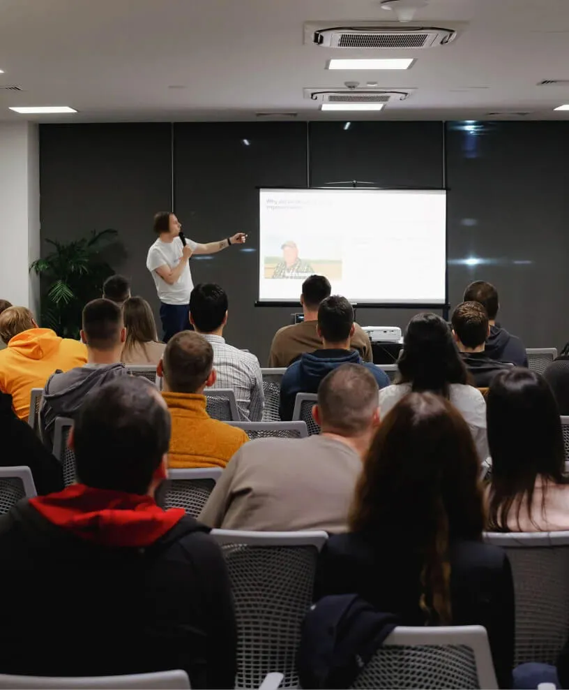 A man presenting if front of a group of people
