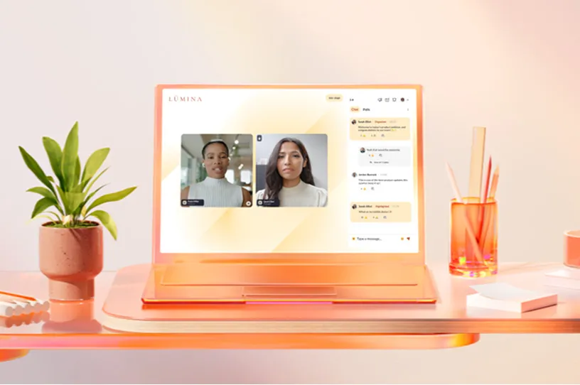 An ongoing Virual event shown on an orange laptop