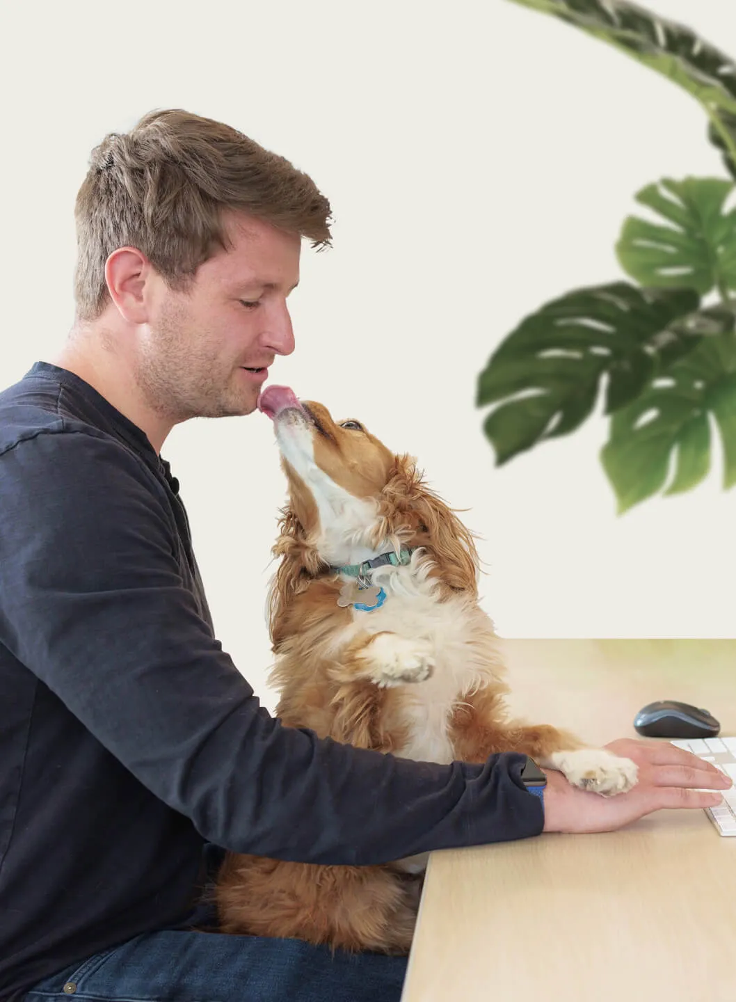 A RingCentral employee and his dog working from home