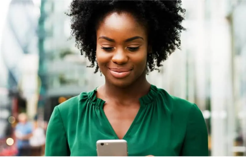 A woman looking at her mobile phone