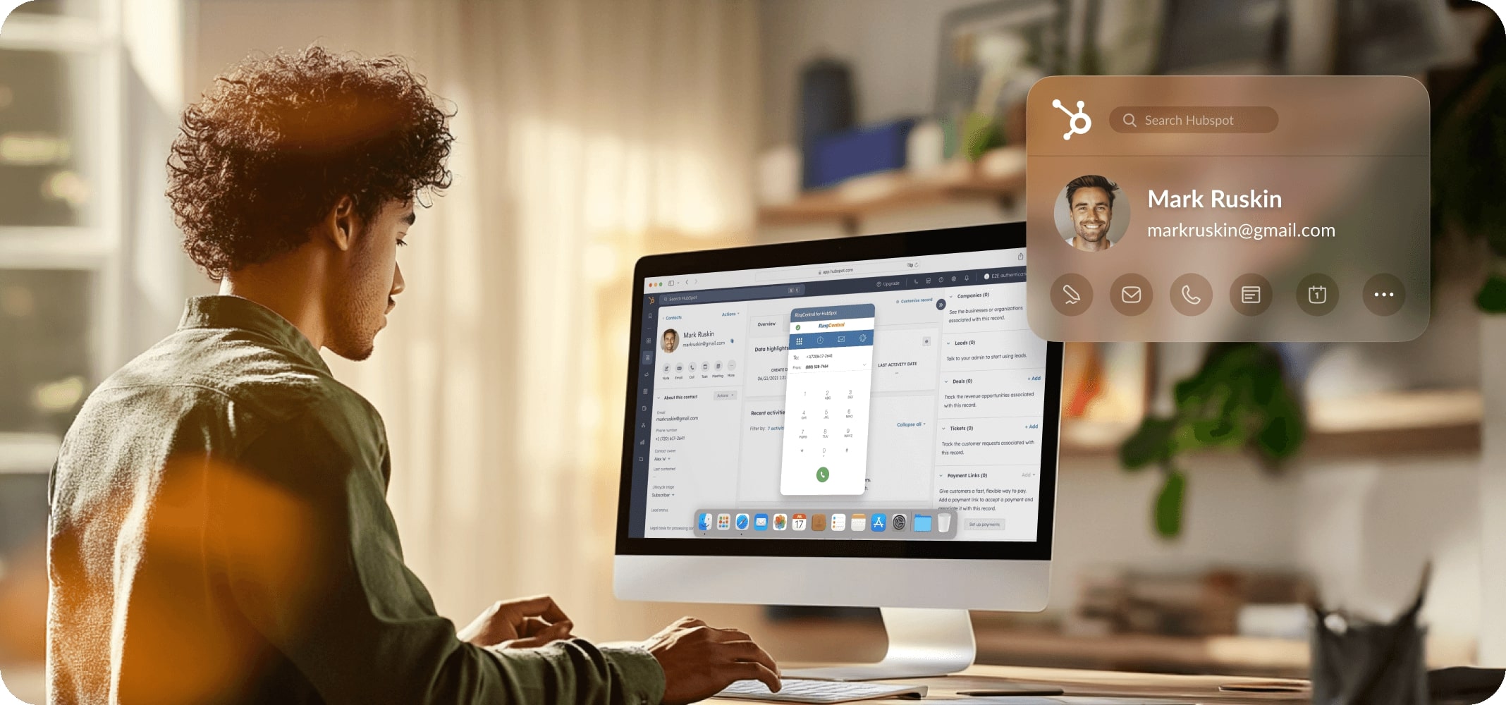 A male sales rep pulling customer record from Hubspot and initiating a call using RingCentral
