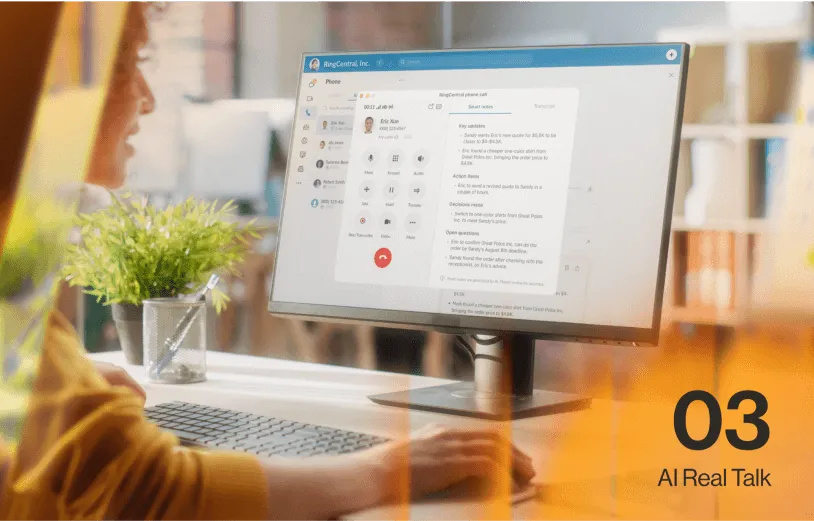 A woman looking at the RingCentral Desktop app on a monitor