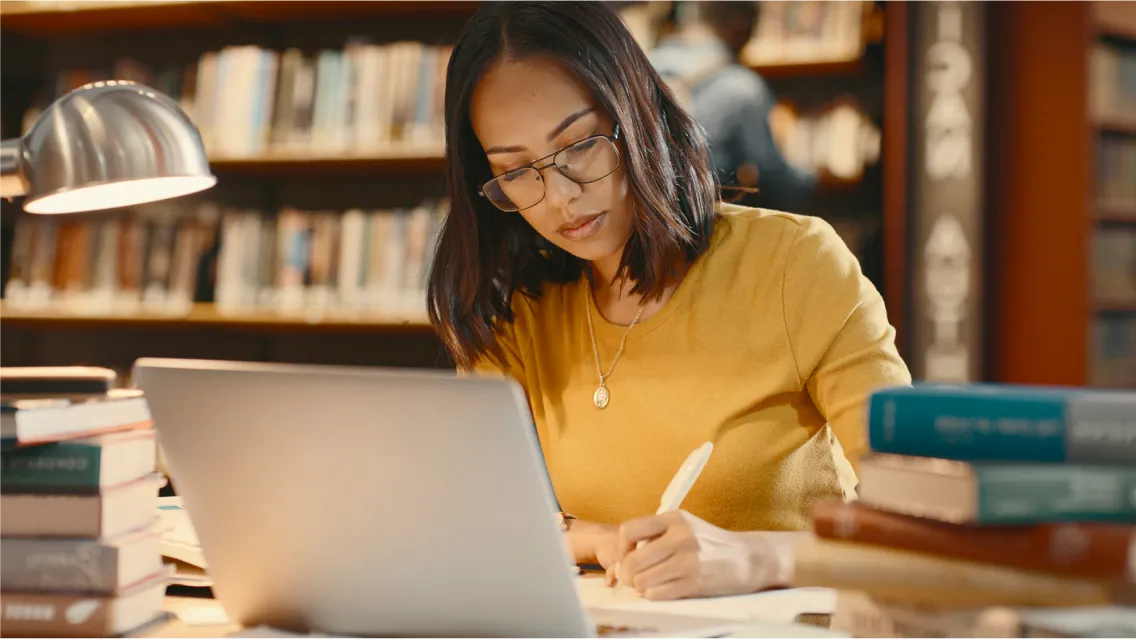 Female taking notes about a meeting