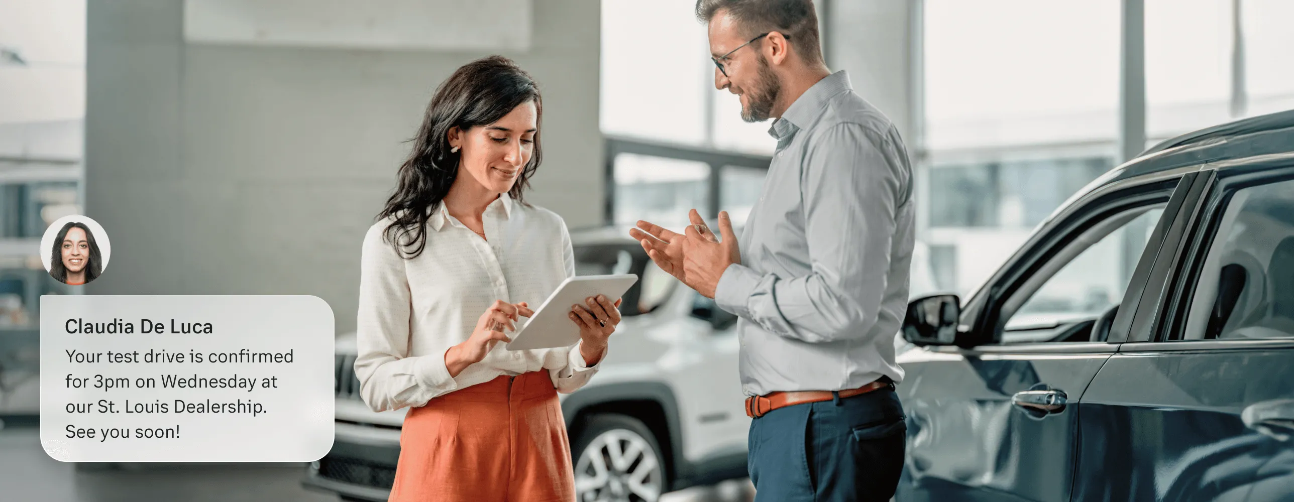 A female car dealer sent a confirmation text abot a test drive appointment to a client via the RingCentral app on her tablet