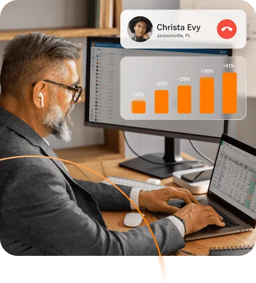 An executive sending a report via the RingCentral app on his laptop