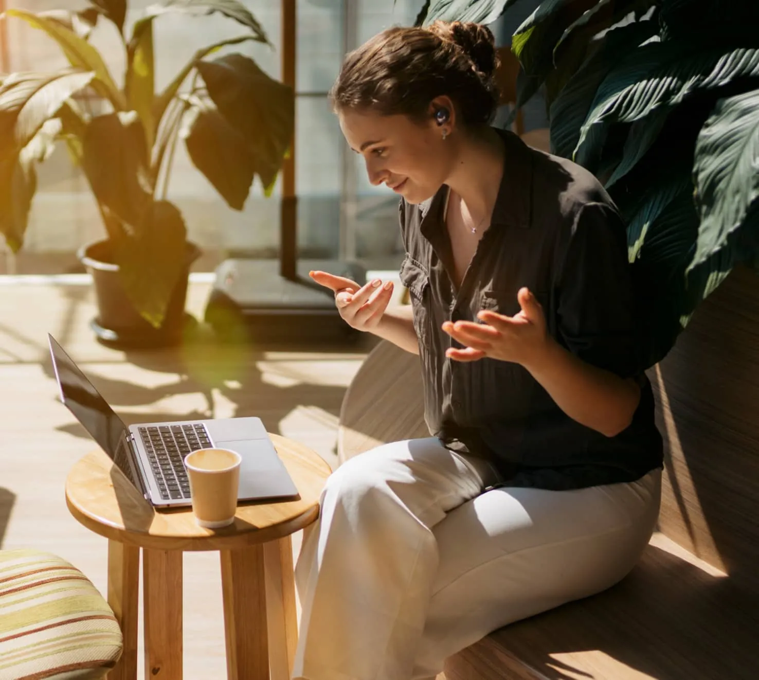 A female investment management specialist on a video call with a client