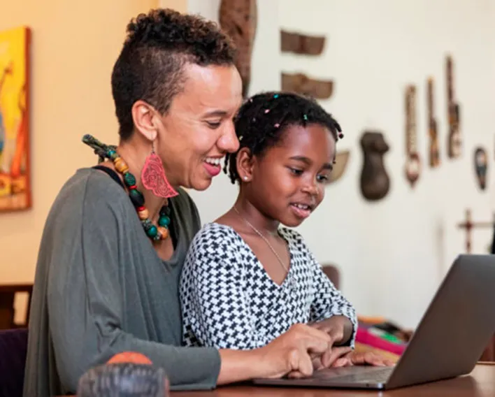 Mother with children studying online