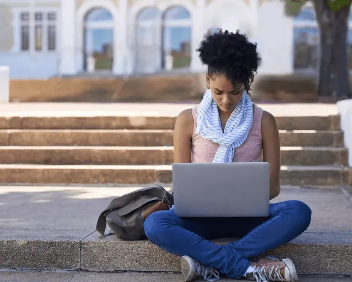Student using RingCentral for Desktop app to study off campus