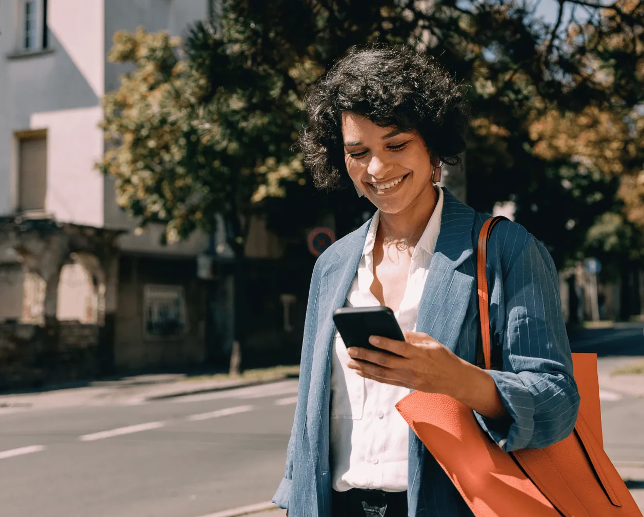 A female consultant looking at her mobile phone with an insert of a list of benefits in using the RingCentral app in a consultancy business