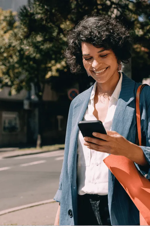 A female consultant looking at her mobile phone with an insert of a list of benefits in using the RingCentral app in a consultancy business