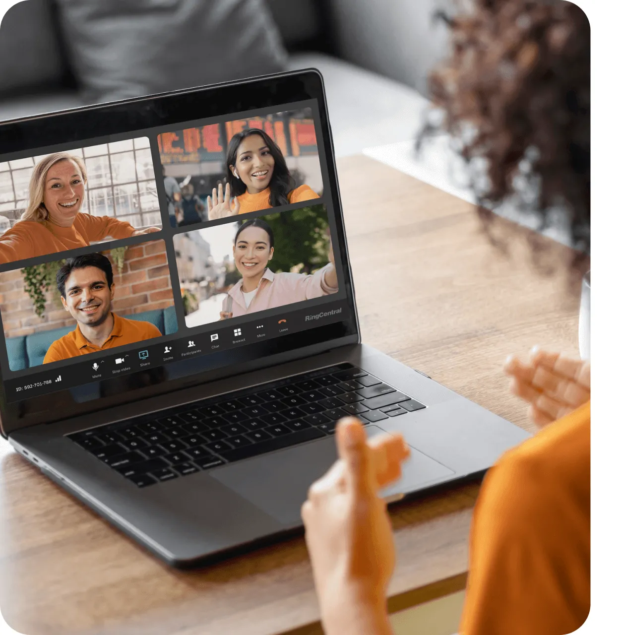 A woman engaged in a RingCentral video conference on her laptop