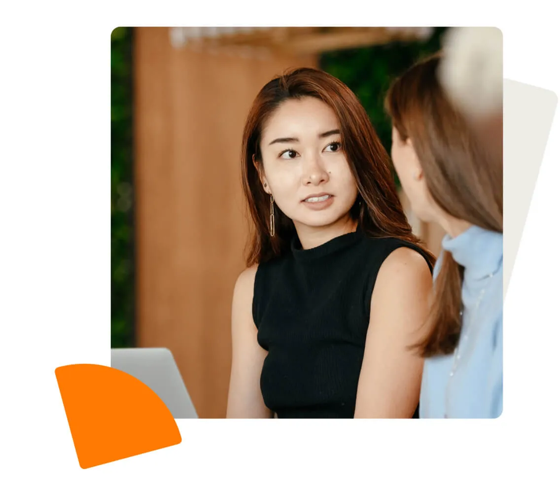 Two women communicating and collaborating