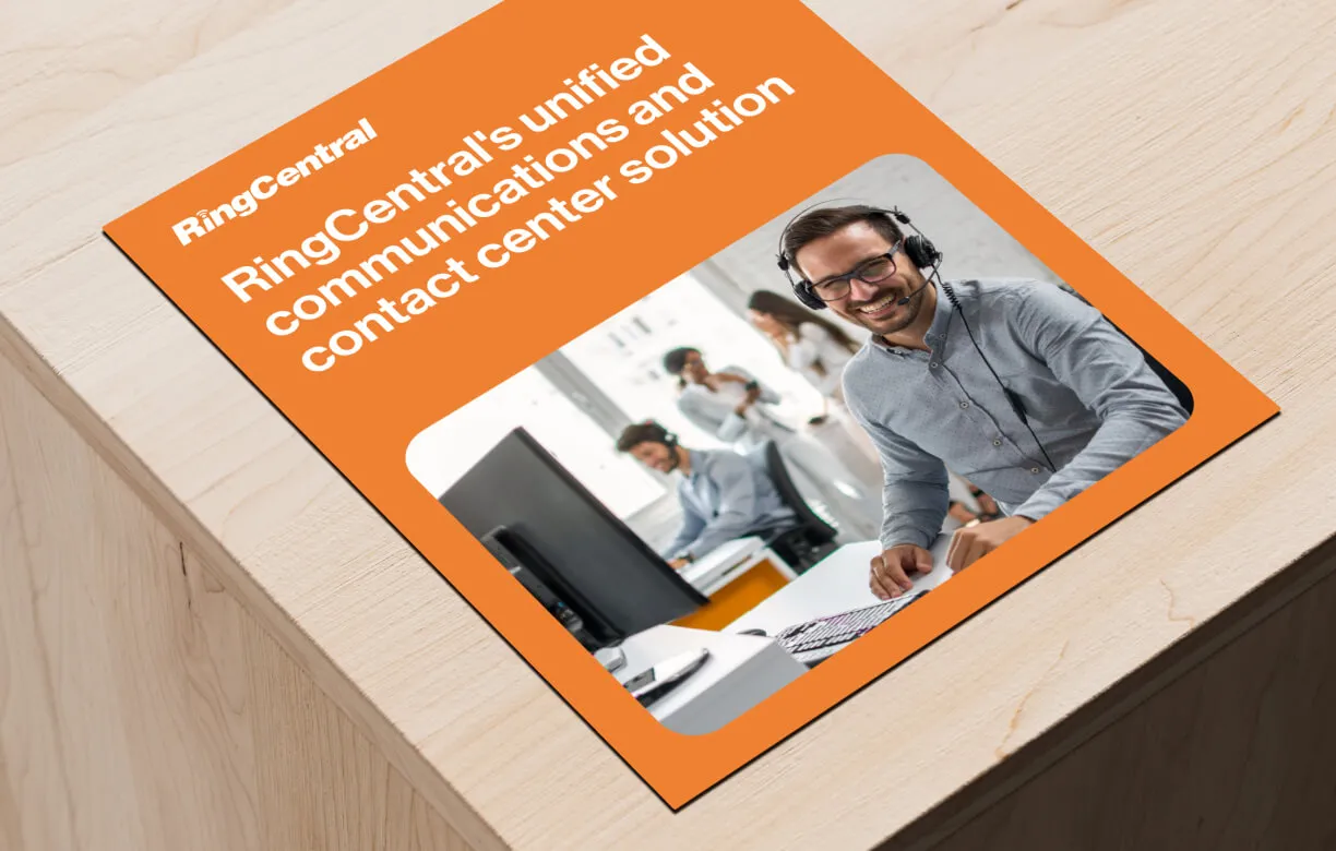an eBook about RingCentral's unified communications and contact center solution on a table