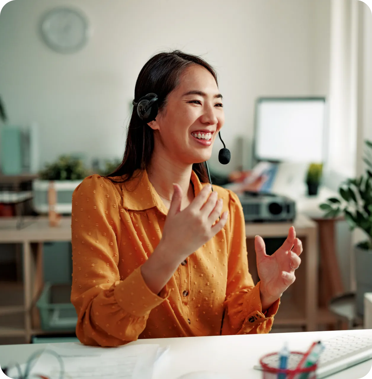 A female agent engaged in a call