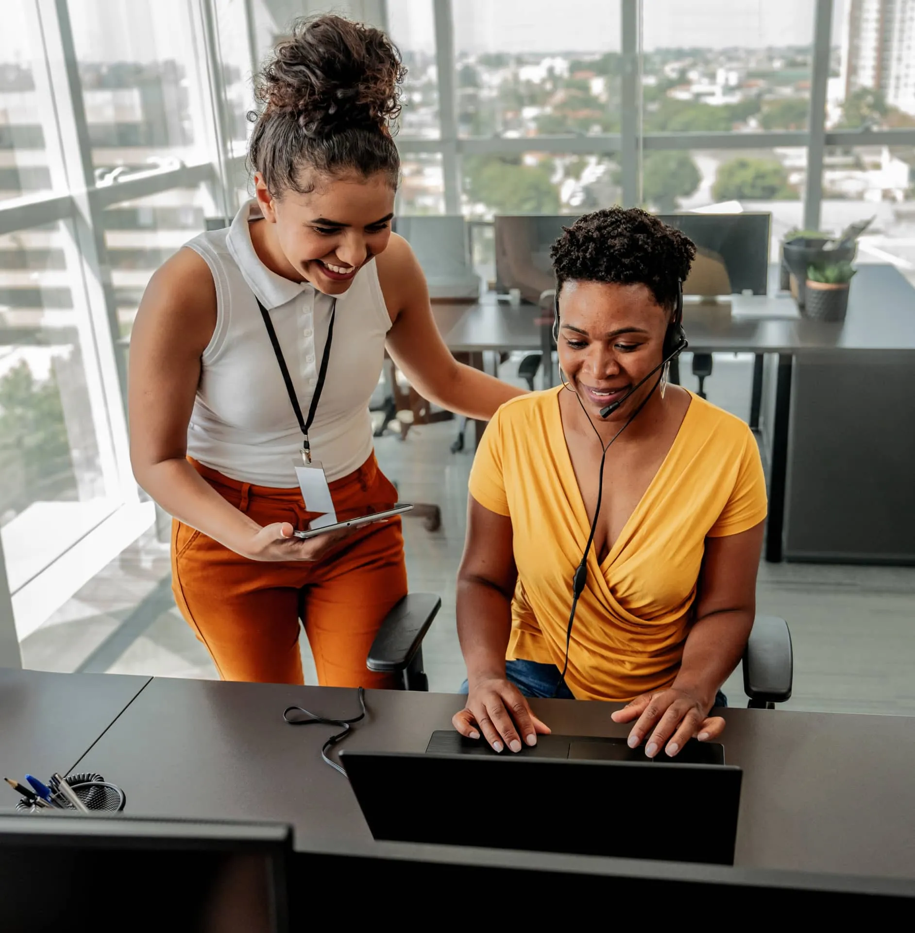 A female manager coaching a female agent