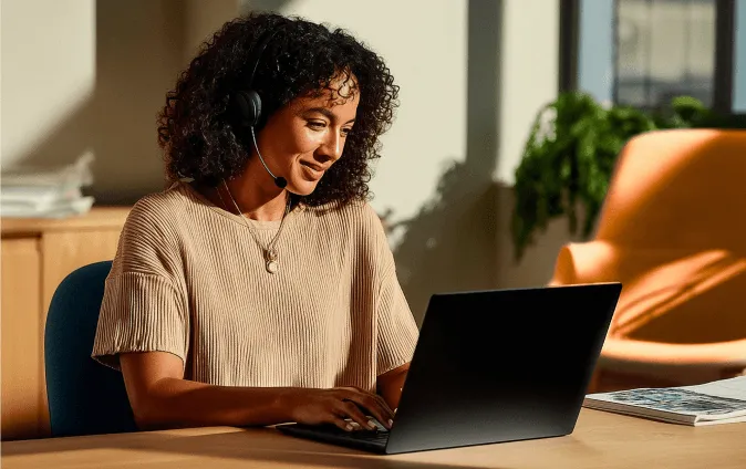 A woman interacting with AI Receptionist for a call on her mobile phone