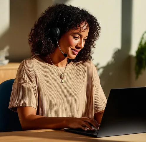 A woman interacting with AI Receptionist for a call on her mobile phone
